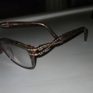 Bebe Gold Cat-Eye Glasses with Glamorous Detailing